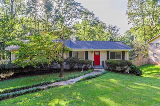 view of front of home with a front yard