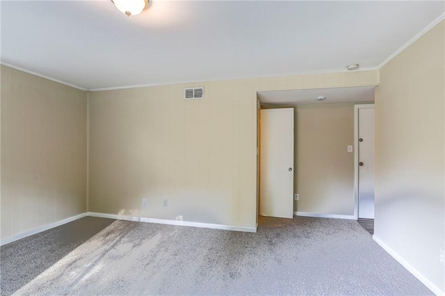 carpeted spare room with ornamental molding