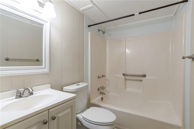 full bathroom featuring vanity, shower / bath combination, wood walls, and toilet