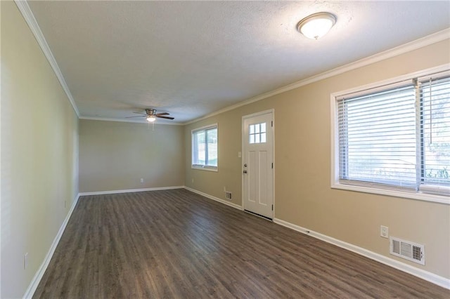 foyer featuring a textured ceiling, ceiling fan, dark hardwood / wood-style floors, and crown molding