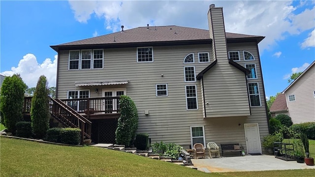 2819 Heritage Oaks Cir, Dacula, GA 30019 - rear view of property featuring a patio area, a yard, a deck, and a chimney