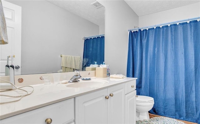190 Crestworth Ct, Powder Springs, GA 30127 - full bathroom with a textured ceiling, toilet, vanity, and a shower with shower curtain