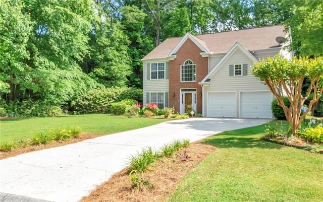 190 Crestworth Ct, Powder Springs, GA 30127 - view of front of home with driveway, an attached garage, a front yard, and brick siding
