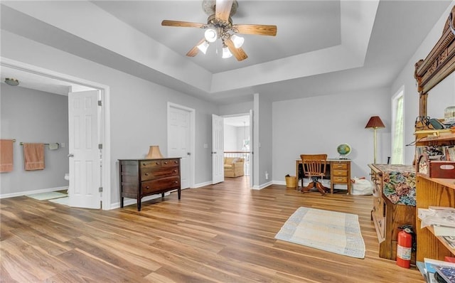 190 Crestworth Ct, Powder Springs, GA 30127 - sitting room with a raised ceiling, ceiling fan, light wood-style flooring, and baseboards