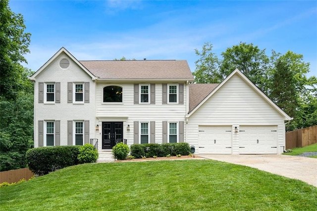 3710 Robinson Walk Ct, Marietta, GA 30068 - colonial house featuring concrete driveway, an attached garage, and roof with shingles