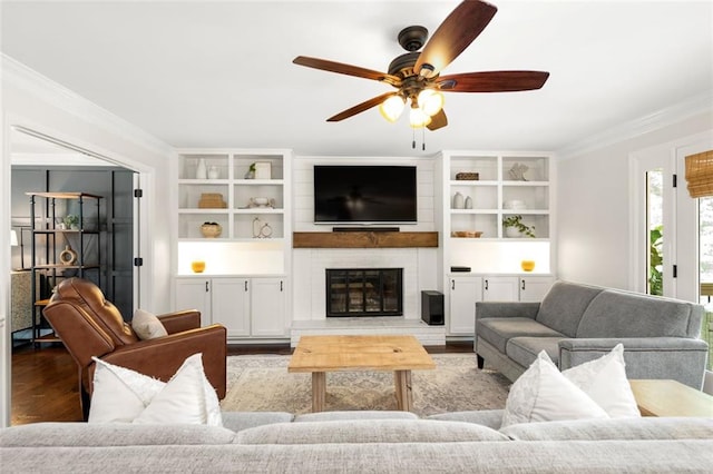 3710 Robinson Walk Ct, Marietta, GA 30068 - living area featuring ornamental molding, ceiling fan, wood finished floors, and a brick fireplace