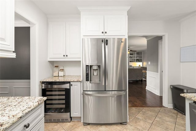 3710 Robinson Walk Ct, Marietta, GA 30068 - kitchen with stainless steel fridge with ice dispenser, beverage cooler, a decorative wall, wainscoting, and light tile patterned flooring