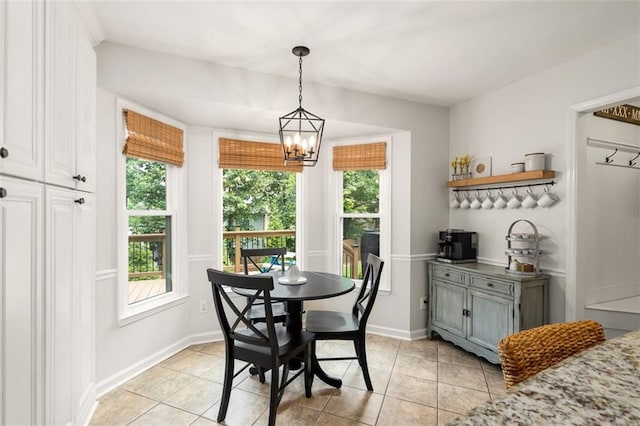 3710 Robinson Walk Ct, Marietta, GA 30068 - dining room with light tile patterned flooring, a chandelier, and baseboards