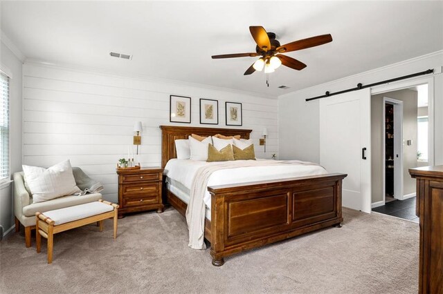 3710 Robinson Walk Ct, Marietta, GA 30068 - bedroom featuring crown molding, a barn door, light carpet, and a ceiling fan