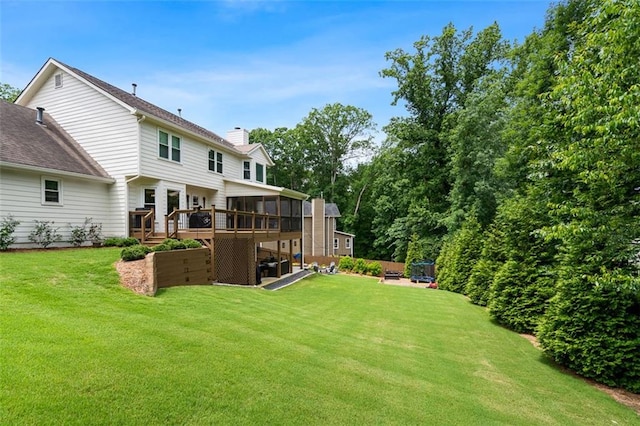 3710 Robinson Walk Ct, Marietta, GA 30068 - rear view of house with a sunroom, a chimney, a deck, a lawn, and roof with shingles