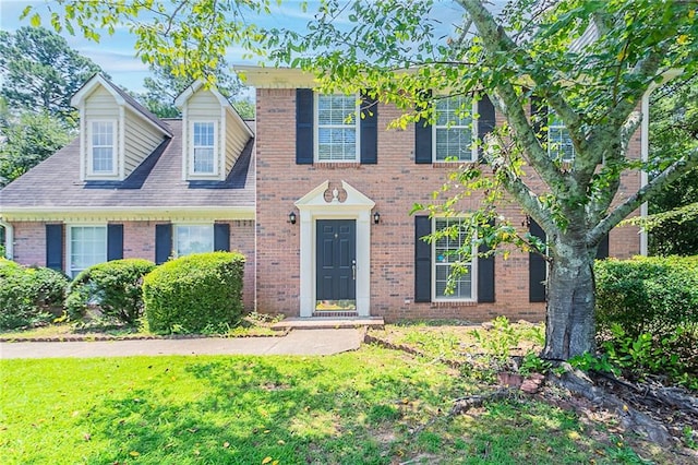 1797 Emerson Lake Cir, Snellville, GA 30078 - view of front of home with brick siding and a front lawn