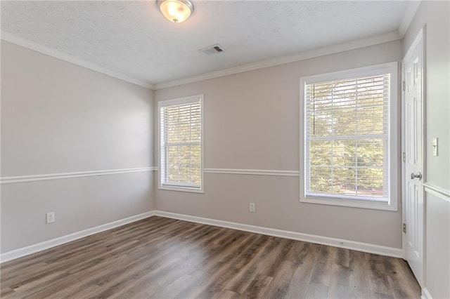 1797 Emerson Lake Cir, Snellville, GA 30078 - spare room featuring wood finished floors, ornamental molding, and a textured ceiling