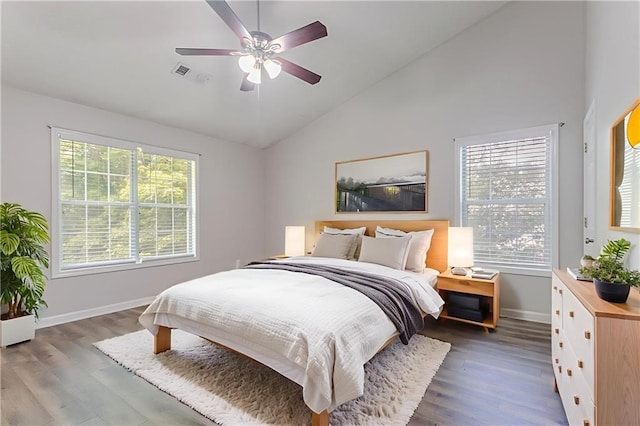 1797 Emerson Lake Cir, Snellville, GA 30078 - bedroom featuring wood finished floors, high vaulted ceiling, and a ceiling fan