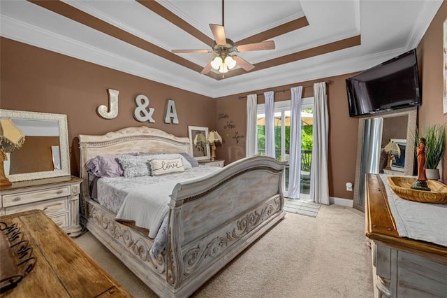930 Brenau Point Dr, Gainesville, GA 30501 - carpeted bedroom featuring a raised ceiling, access to outside, crown molding, ceiling fan, and baseboards