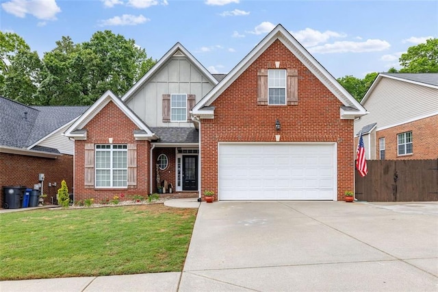 930 Brenau Point Dr, Gainesville, GA 30501 - traditional-style house with board and batten siding, brick siding, concrete driveway, and a garage