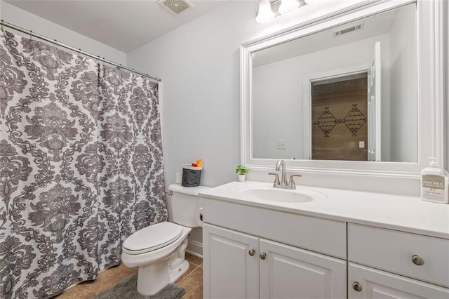 930 Brenau Point Dr, Gainesville, GA 30501 - full bathroom featuring vanity, toilet, tile patterned floors, and a shower with curtain