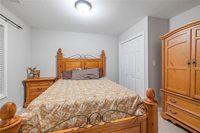 930 Brenau Point Dr, Gainesville, GA 30501 - bedroom with light carpet, a closet, and baseboards