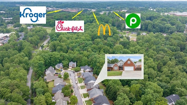 930 Brenau Point Dr, Gainesville, GA 30501 - aerial perspective of suburban area with a heavily wooded area
