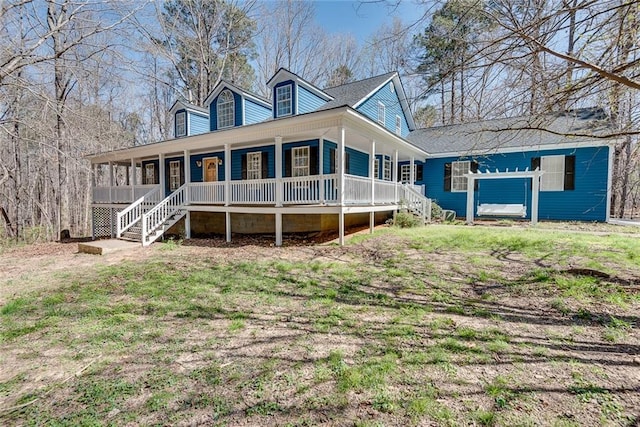 back of house featuring a porch