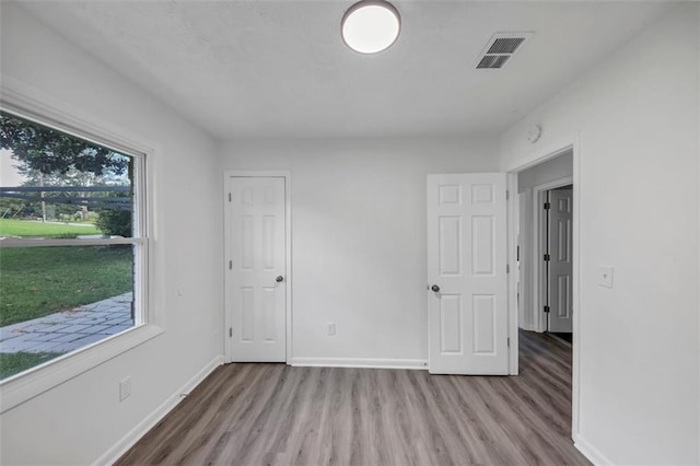 empty room with light wood-type flooring