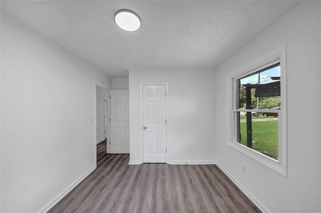 unfurnished bedroom featuring light hardwood / wood-style floors