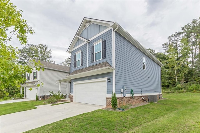 craftsman-style house featuring central AC, a front lawn, and a garage