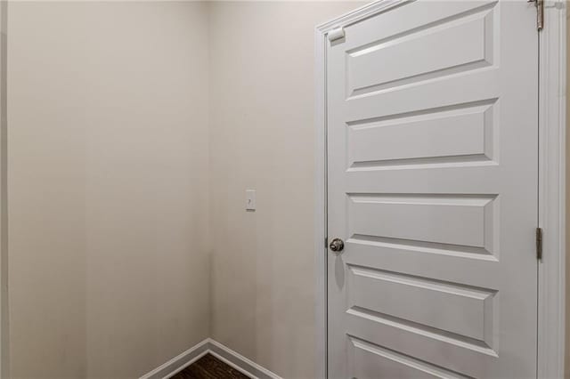 doorway to outside featuring wood-type flooring