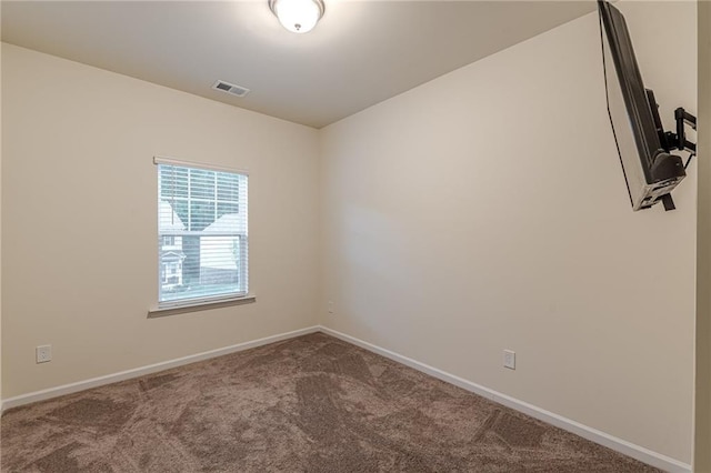 spare room with carpet flooring