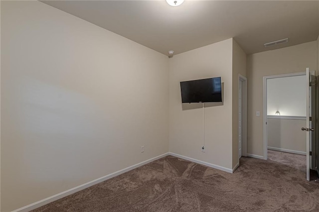 unfurnished bedroom with carpet flooring