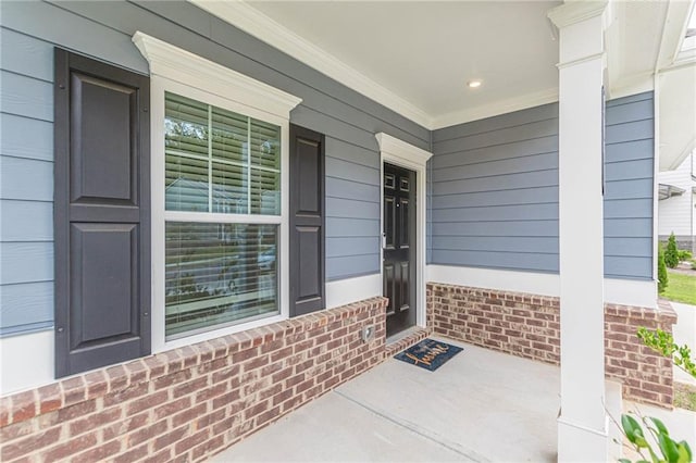 property entrance featuring covered porch