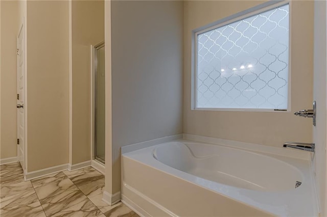 bathroom with independent shower and bath