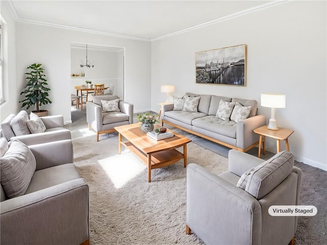 carpeted living room featuring crown molding and an inviting chandelier