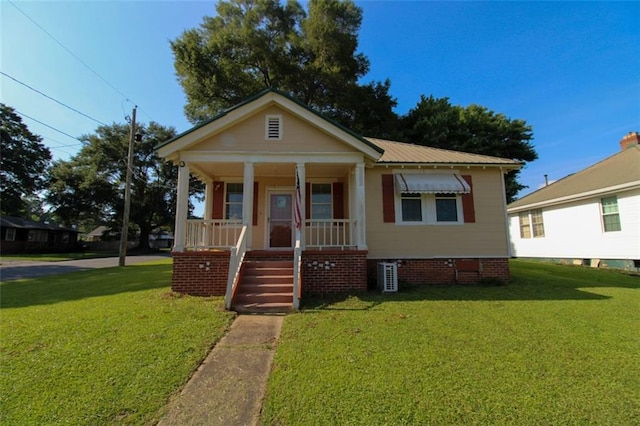200 Litchfield St, Rockmart, GA 30153 - view of front facade featuring covered porch, a front yard, a metal roof, and crawl space