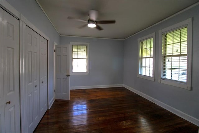 200 Litchfield St, Rockmart, GA 30153 - unfurnished bedroom featuring dark wood-style floors, crown molding, a closet, and ceiling fan