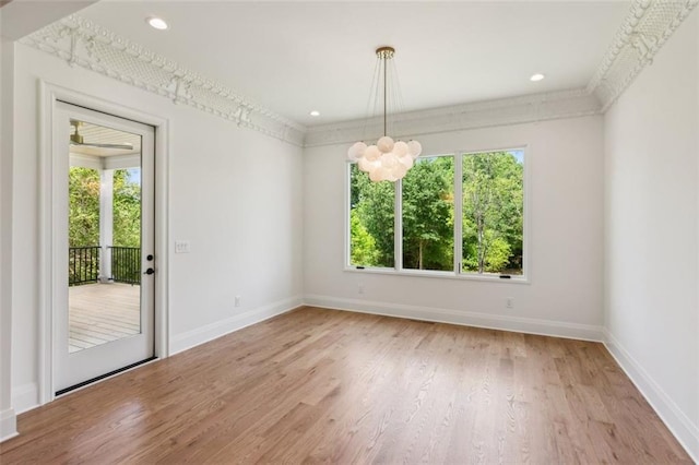 7188 Williams Rd, Flowery Branch, GA 30542 - spare room with plenty of natural light, a chandelier, light wood-style flooring, baseboards, and recessed lighting