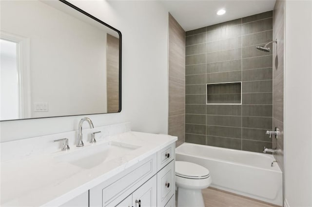 7188 Williams Rd, Flowery Branch, GA 30542 - bathroom with vanity, toilet, and washtub / shower combination