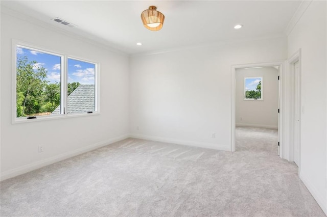 7188 Williams Rd, Flowery Branch, GA 30542 - spare room with ornamental molding, light carpet, baseboards, and recessed lighting