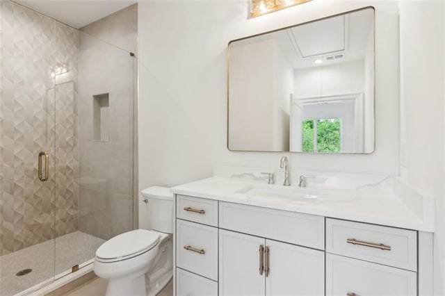 7188 Williams Rd, Flowery Branch, GA 30542 - full bathroom featuring vanity, toilet, and a shower stall