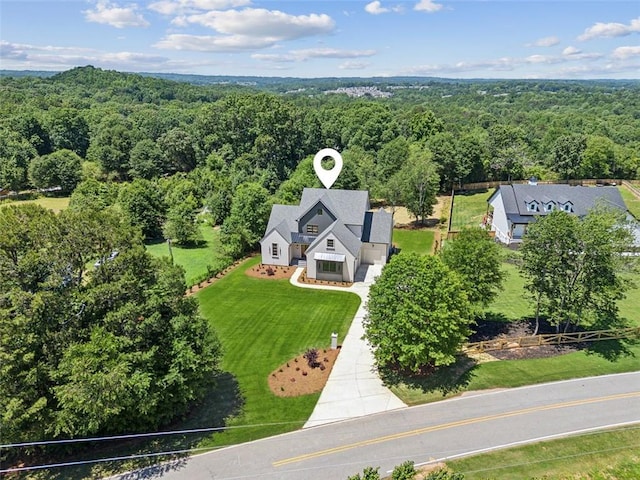 7188 Williams Rd, Flowery Branch, GA 30542 - aerial view of property and surrounding area featuring a heavily wooded area