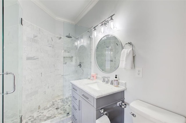 full bathroom with toilet, a stall shower, ornamental molding, and vanity