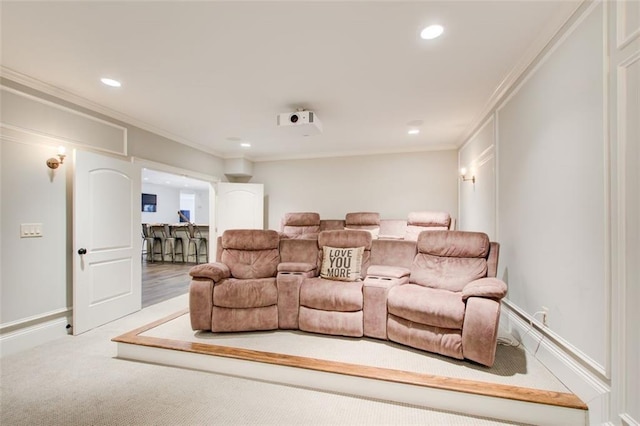 carpeted cinema room featuring recessed lighting and crown molding