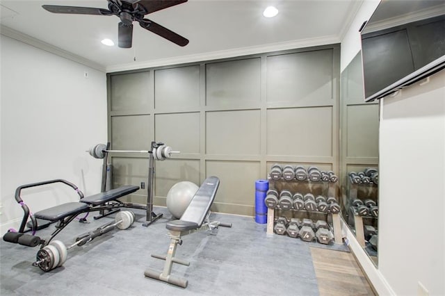 exercise room with crown molding, recessed lighting, a decorative wall, and ceiling fan