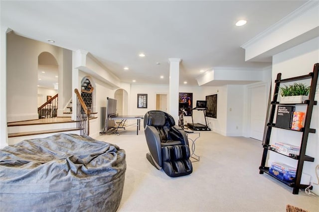 interior space with arched walkways, recessed lighting, light colored carpet, ornamental molding, and stairs