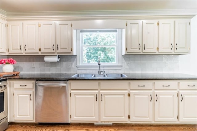 3664 Maple Forge Ln, Gainesville, GA 30504 - kitchen with stainless steel dishwasher, backsplash, ornamental molding, and white cabinets