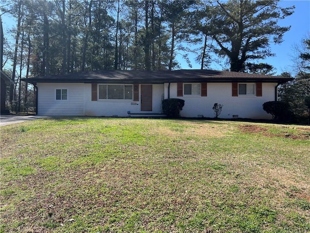 ranch-style house with brick siding, crawl space, and a front lawn