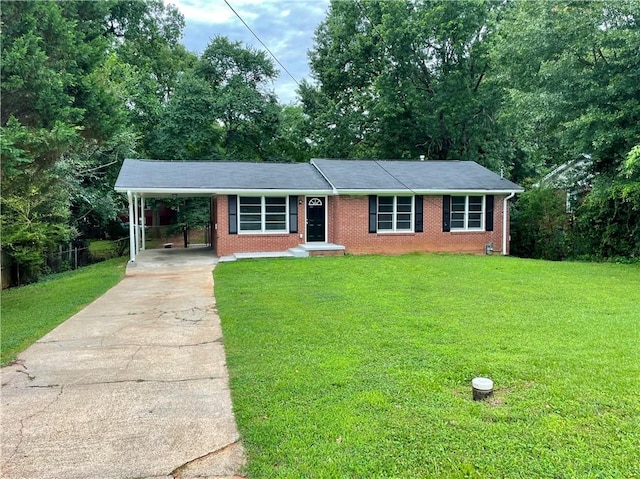 25 Gladstone Dr SW, Marietta, GA 30060 - ranch-style home with concrete driveway, brick siding, a front yard, and an attached carport