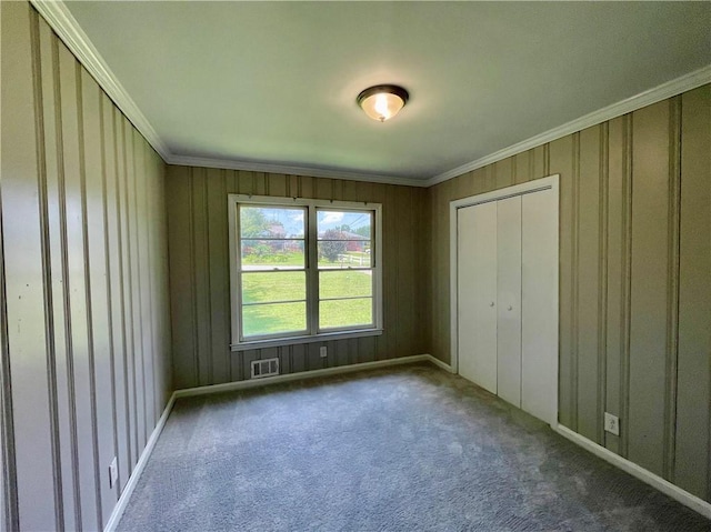 25 Gladstone Dr SW, Marietta, GA 30060 - unfurnished bedroom with ornamental molding, carpet floors, and a closet