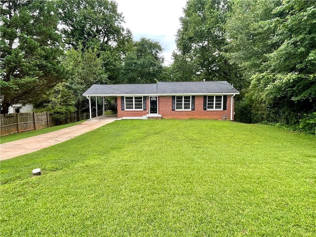 25 Gladstone Dr SW, Marietta, GA 30060 - view of front of property with driveway, an attached carport, and brick siding