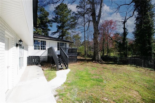 view of yard with a deck