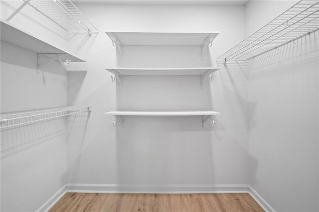 3156 Ozmer Lndg, Decatur, GA 30034 - walk in closet featuring wood finished floors